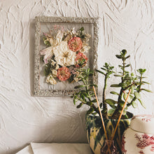 Load image into Gallery viewer, Close up of Bespoke handmade pressed flower frame featuring personally picked and arranged flowers, set in a hand-soldered silver frame, perfect for celebrating special moments and adding elegance to any home