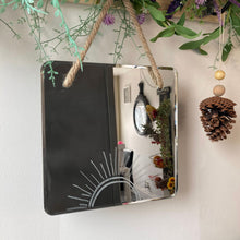 Load image into Gallery viewer, Charming handmade sunshine mirror, hand-engraved with intricate designs, crafted with care to illuminate your space and bring warmth and cheer into any room