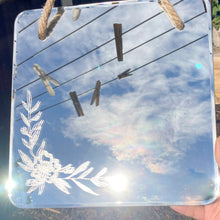 Load image into Gallery viewer, Charming handmade floral mirror, hand-engraved with intricate designs, crafted with care to illuminate your space and bring warmth and cheer into any room
