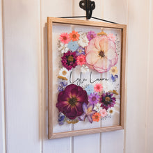 Load image into Gallery viewer, A close up of handcrafted pressed flower frame featuring vibrant pink hues, perfect for home decor.