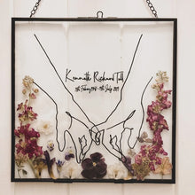 Load image into Gallery viewer, Bespoke handmade pressed flower frame, meticulously crafted with your choice of pressed flowers, in a stylish black double glass frame measuring 26x26cm, offering a personalised way to commemorate cherished memories and create a lasting tribute.