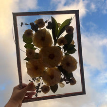 Load image into Gallery viewer, Sky background with Bespoke handmade pressed flower frame featuring personally picked and arranged flowers, set in a hand-soldered silver frame, perfect for celebrating special moments and adding elegance to any home