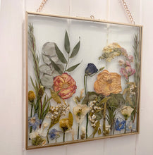 Load image into Gallery viewer, Bespoke handmade meadow frame showcasing delicately pressed wildflowers, capturing the essence of nature in silver frame