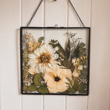 Load image into Gallery viewer, Bespoke handmade meadow frame showcasing delicately pressed wildflowers, capturing the essence of nature in square black frame
