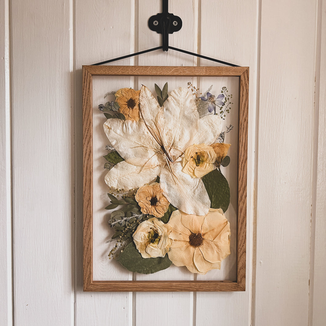 Bridal pressed flower oak frame size a4 featuring brides original flowers with in it. 